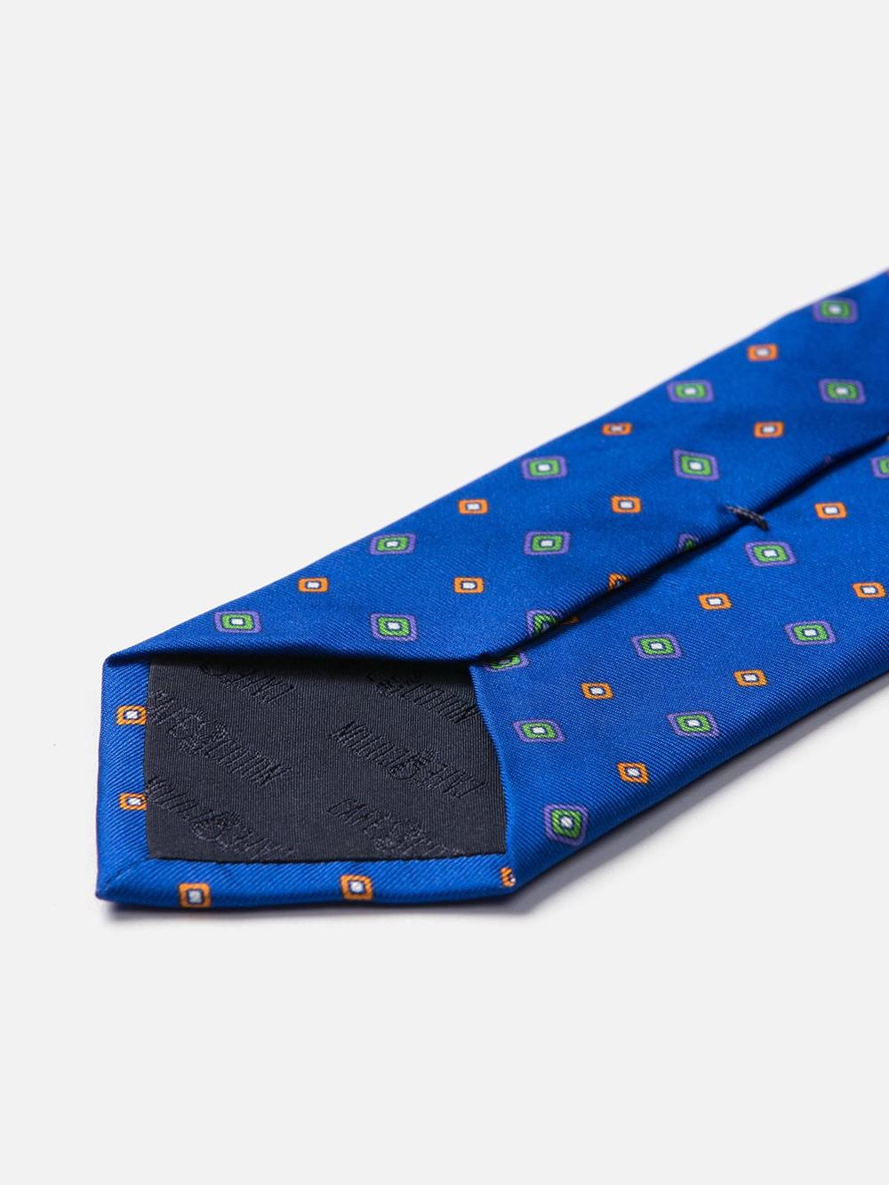 Blue silk tie with printed geometric patterns