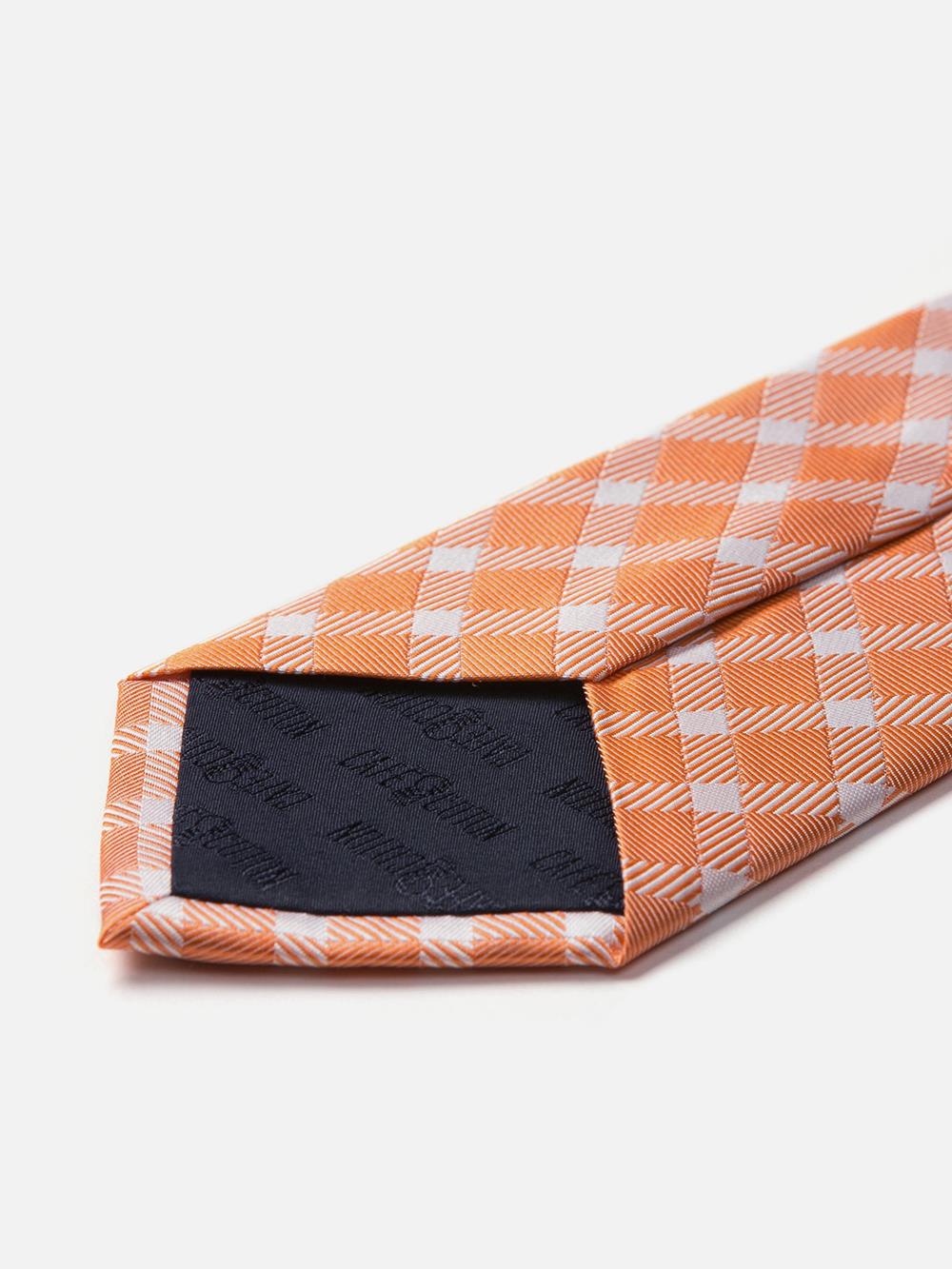Cravate en soie orange à carreaux