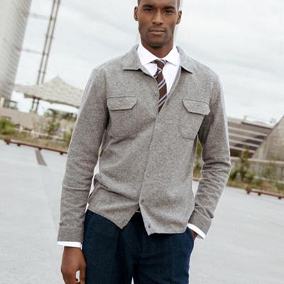 The cardigan, a piece with a timeless dandy chic spirit