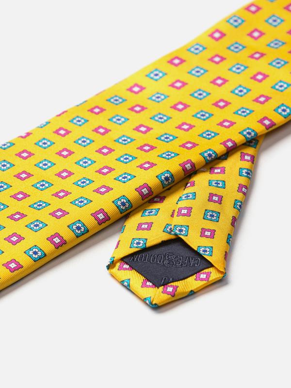 Yellow silk tie with printed patterns