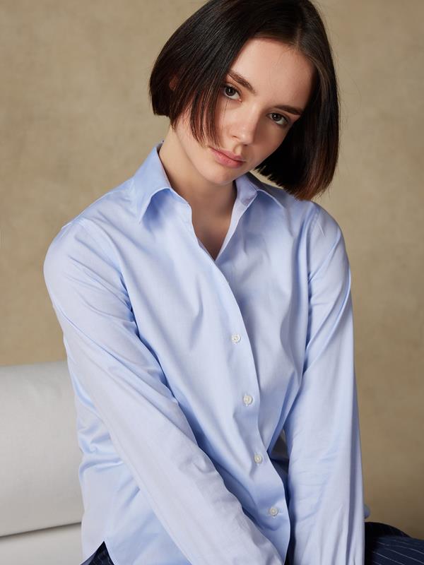 Albane in light blue pinpoint shirt 