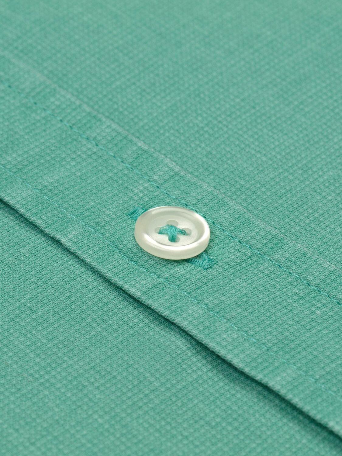 Green piqu&eacute; shirt