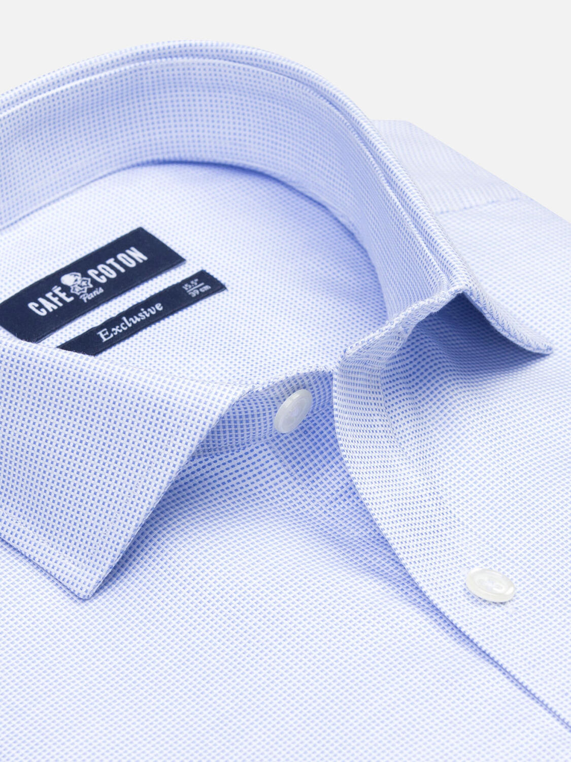 Camisa entallada trenza cielo