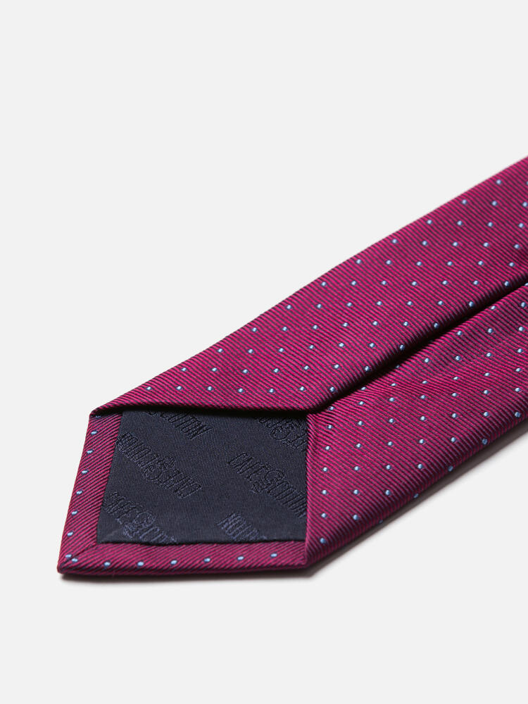 Tie in fuchsia silk reps with sky polka dots