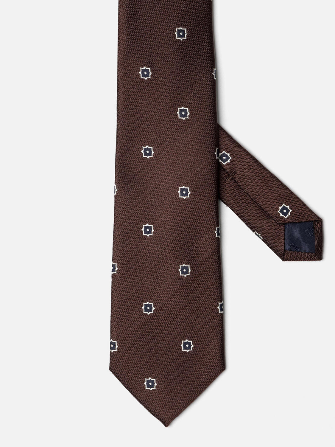 Chocolate silk tie with navy pattern