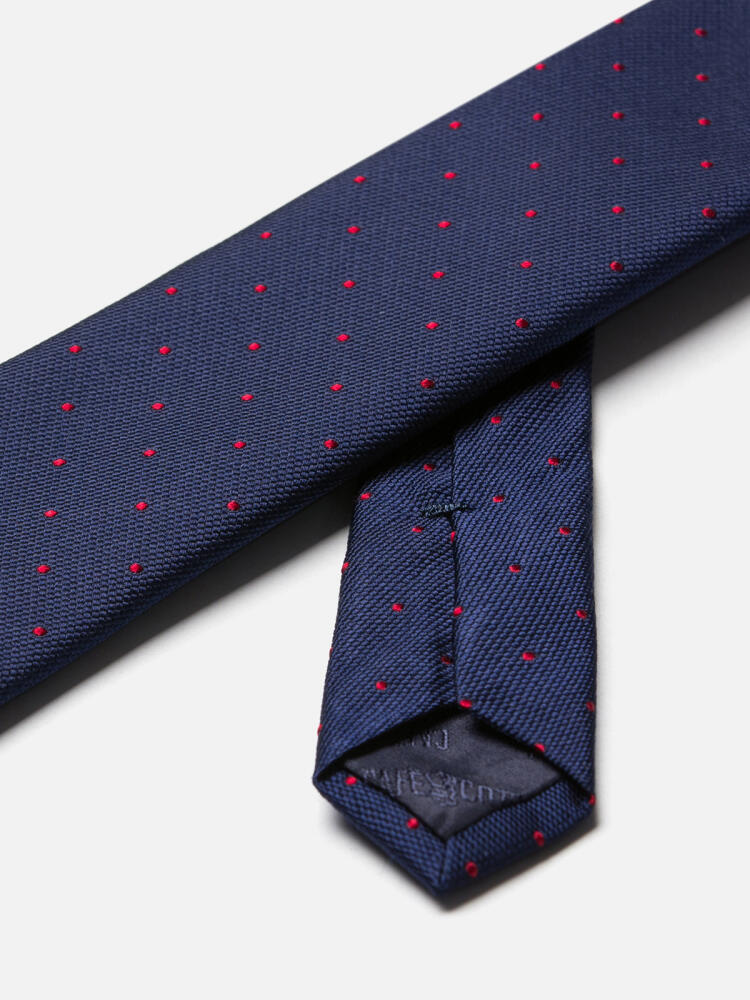 Corbata Paolo de seda azul marino con lunares rojos