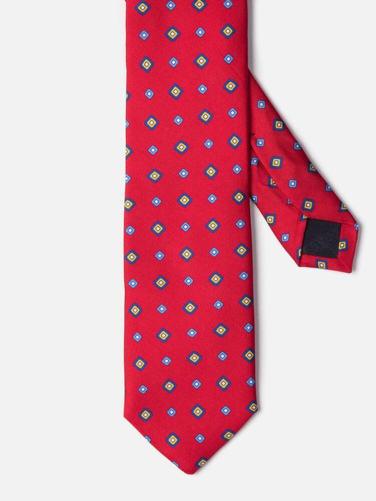 Red silk tie with printed geometric patterns