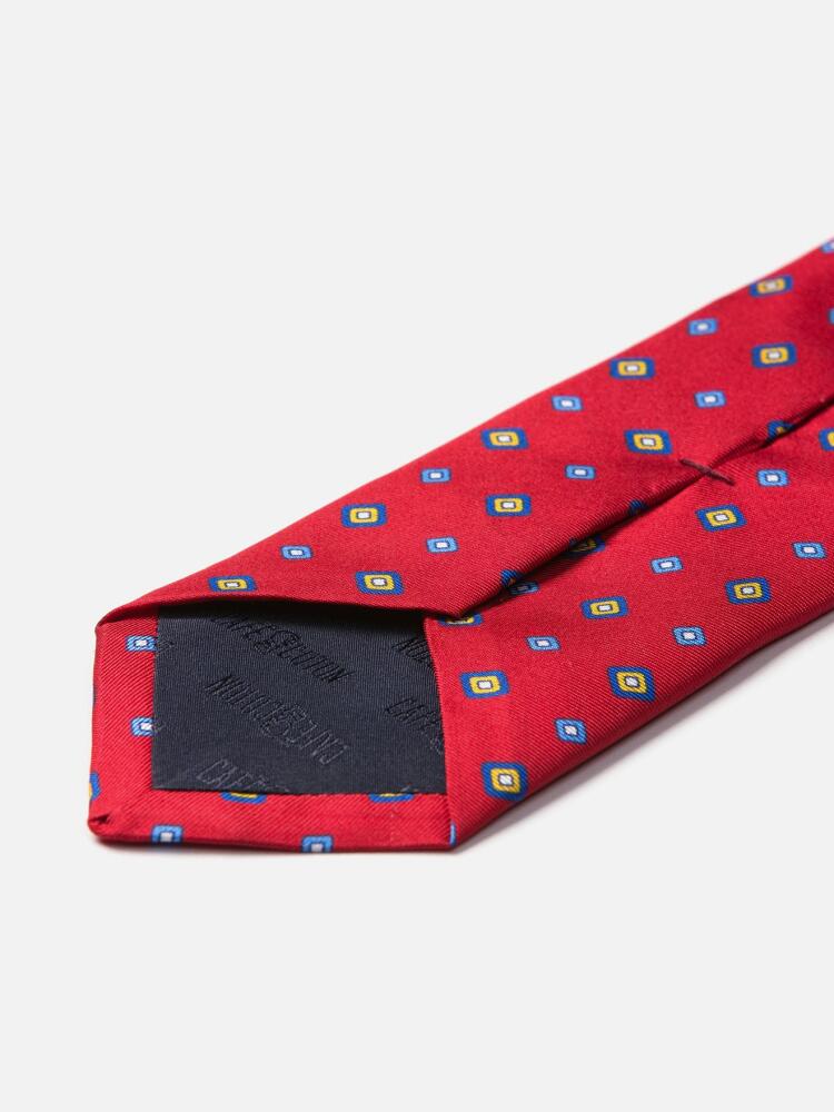 Red silk tie with printed geometric patterns