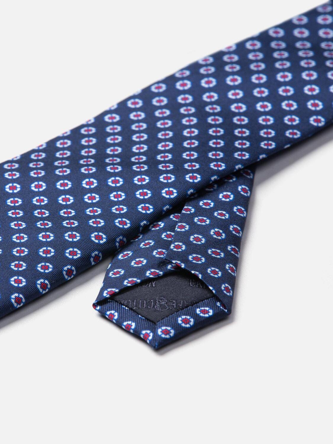 Cravate en soie marine &agrave; motifs imprim&eacute;s fuchsia