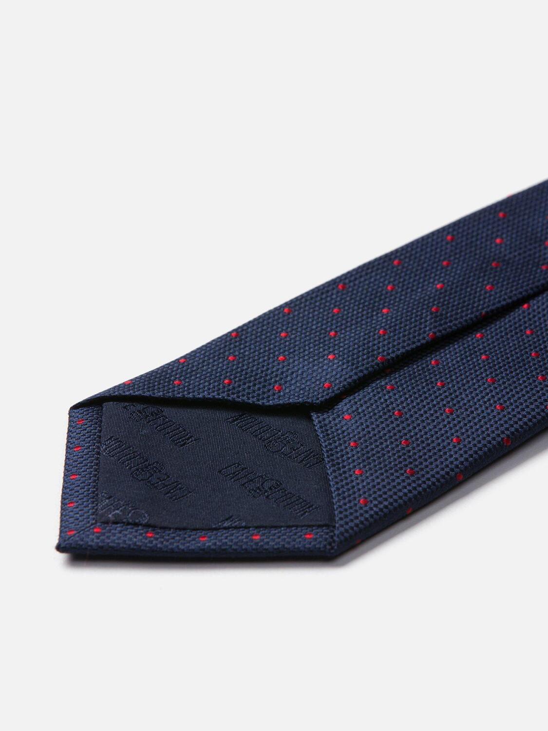 Cravate en soie marine &agrave; pois rouge