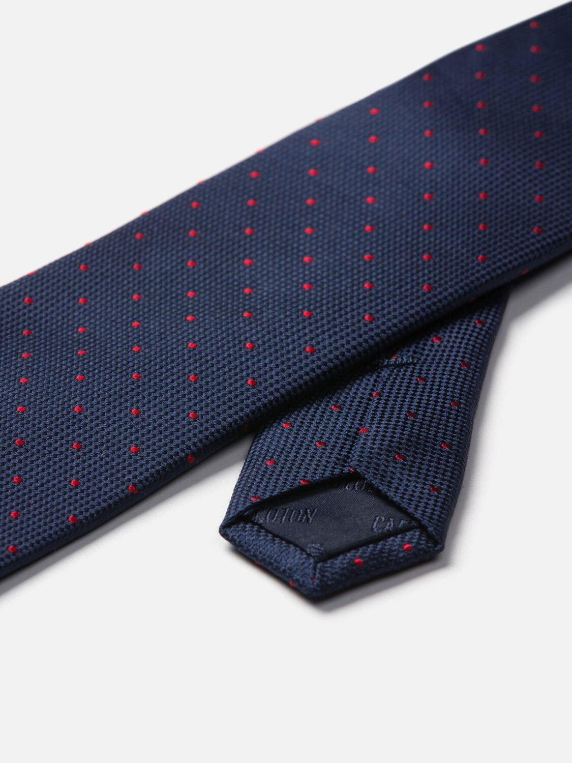 Cravate en soie marine &agrave; pois rouge