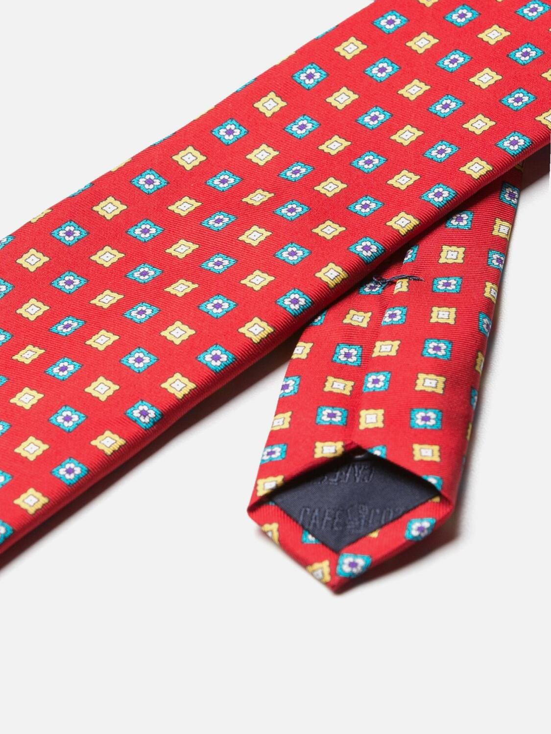 Orange silk tie with floral pattern