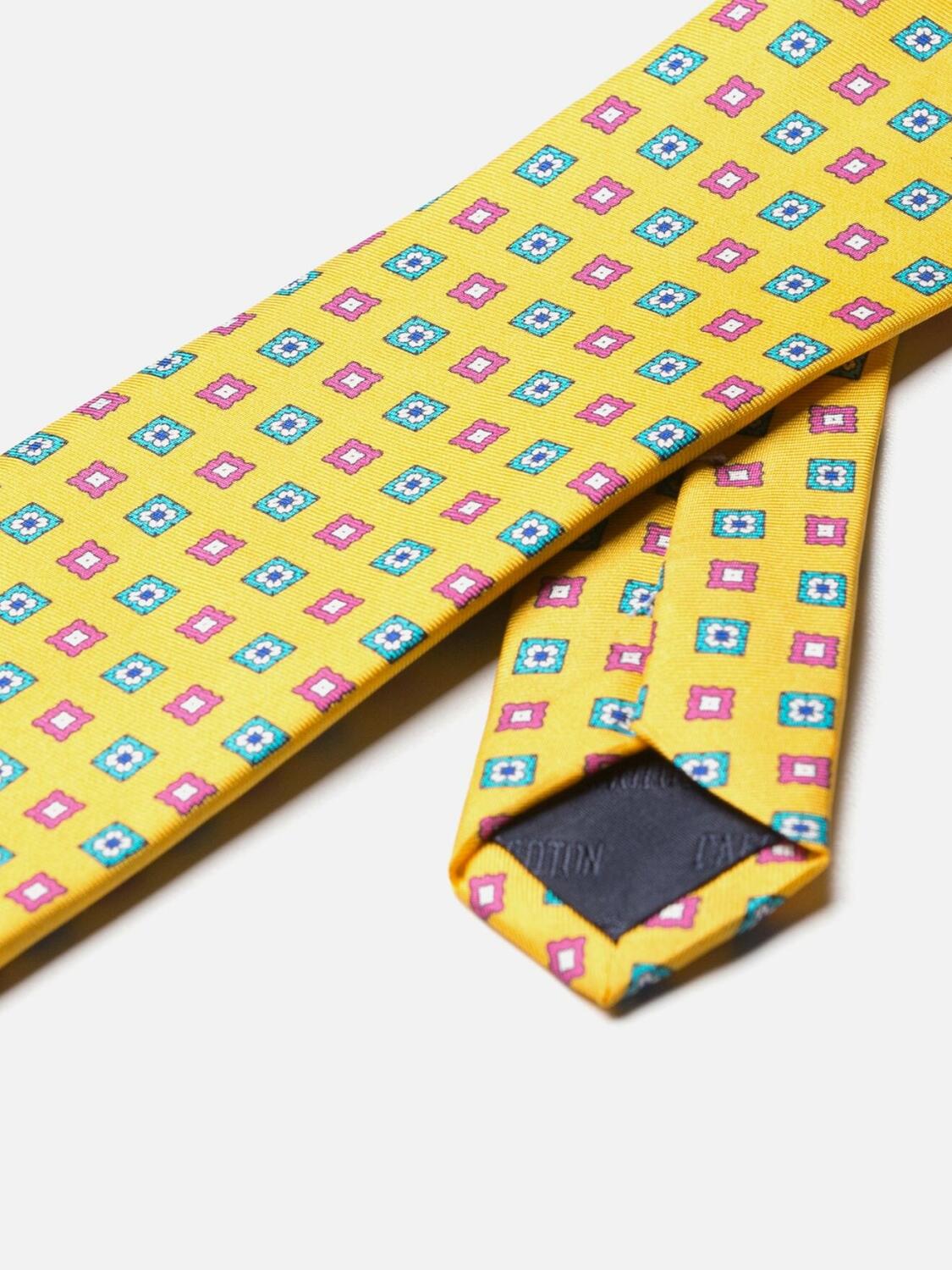 Yellow silk tie with floral pattern