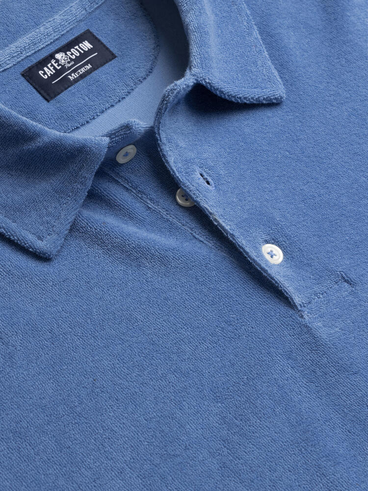 Polo de rizo celeste