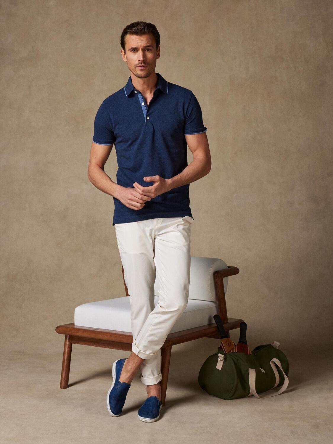 Swan polo in gevlekt blauw piqué