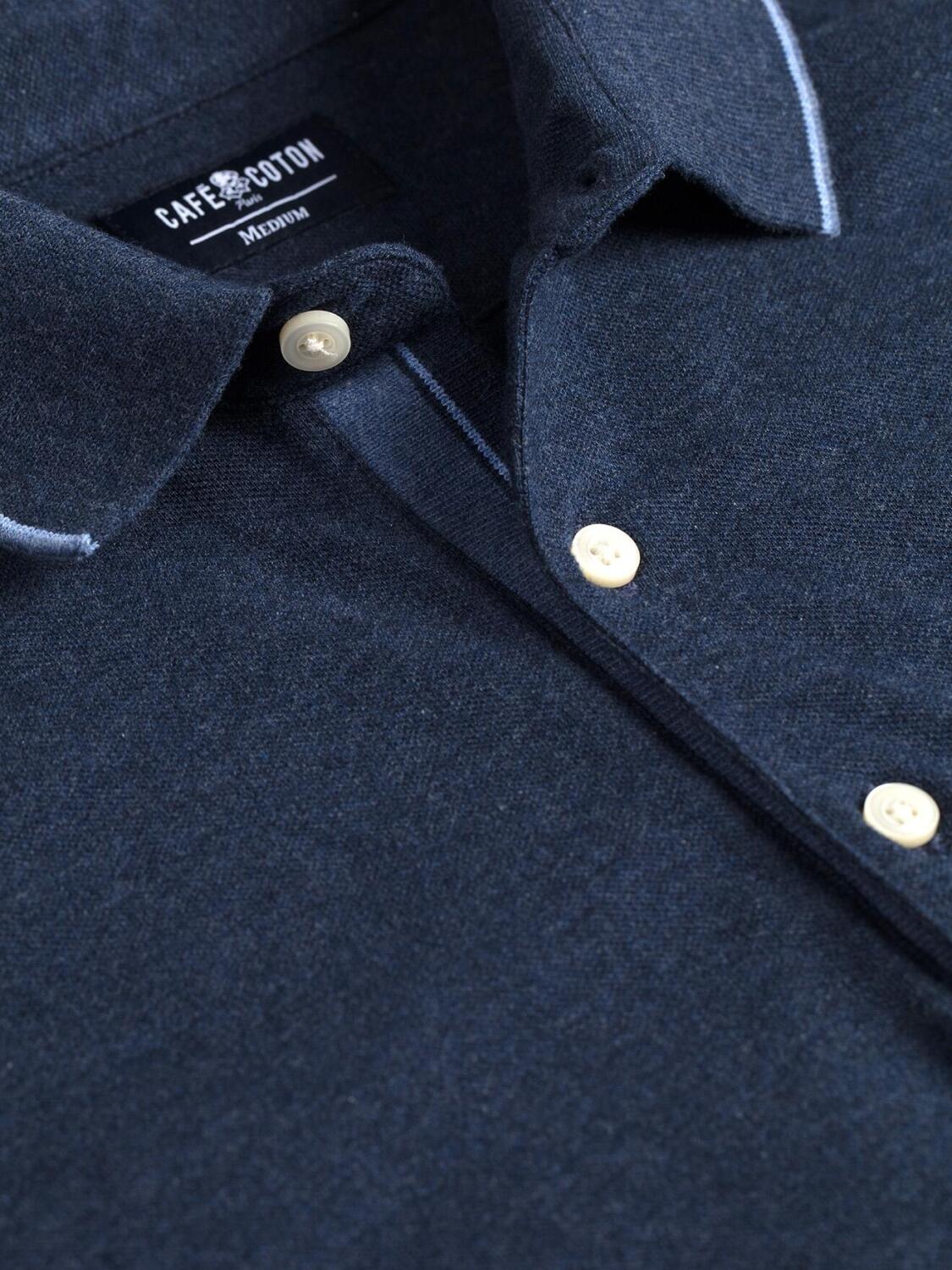 Swan polo in gevlekt blauw piqué