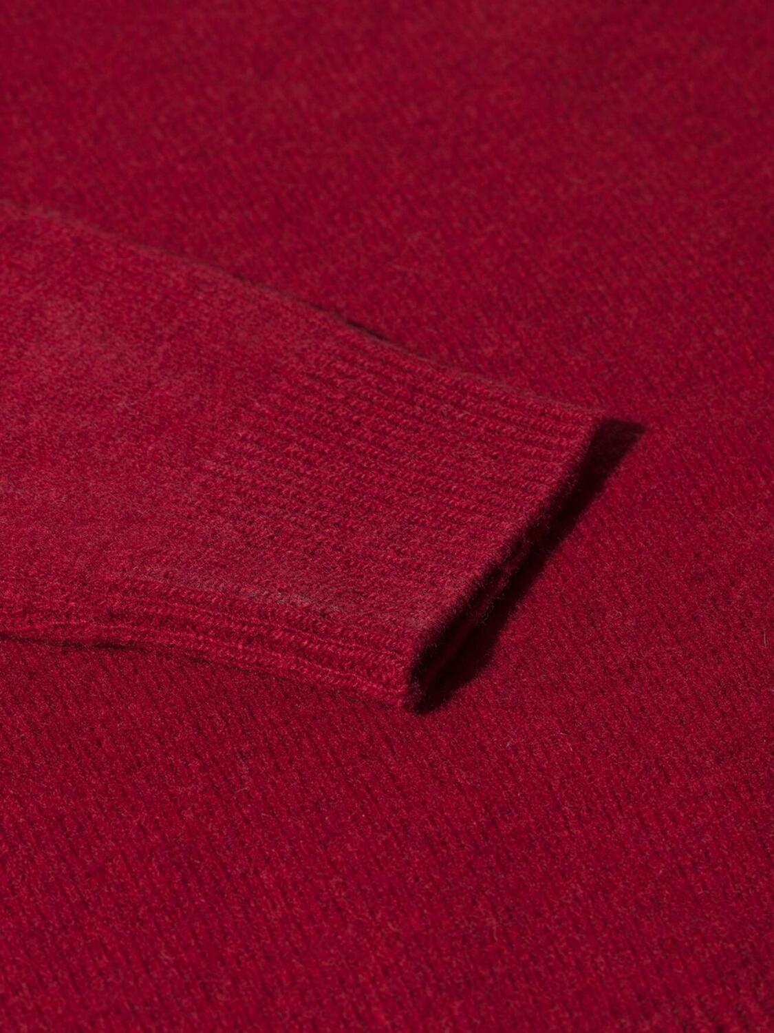 Trui met roode V-hals, lamswol