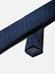 Cravate fine en soie marine à pois bleus